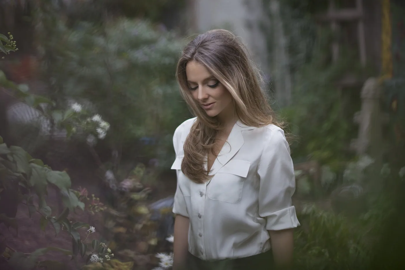 Violette, French singer-songwriter, in a garden